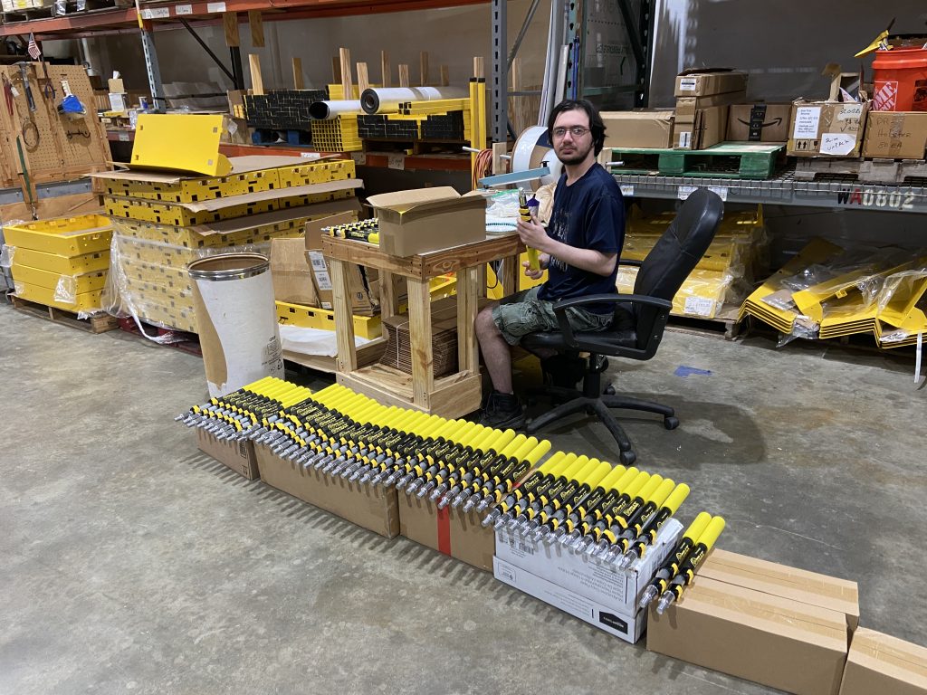 Saw Trax team member assembling and checking Pocket Reachers