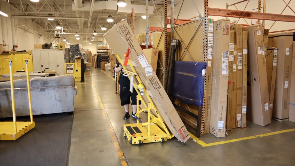 Safer Way to Move Products with Scoop Dolly Safer Way to Move Products with Scoop Dolly